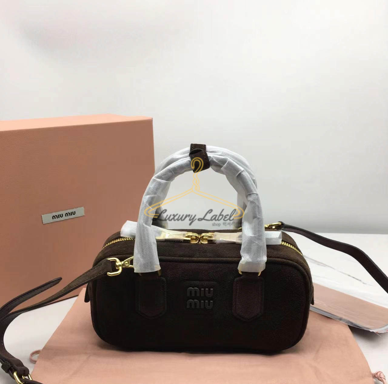 미우미우 MIU MIU 소프티 패디드 아르카디 (스웨이드) (컬러 다크브라운)